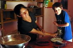 Grinding Coco beans to make chocolate